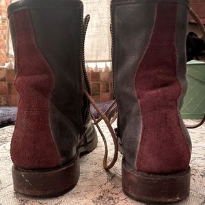 Freebird Manchester distressed black leather tie boots with red suede stripe.